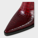 Krokodillimustrilised saapad elegantse kontsaga